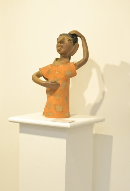 Figure with raised hand